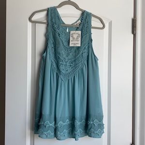 Lacey sleeveless blouse